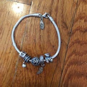 Silver pandora bracelet with charms
